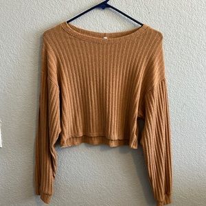 Only worn twice, orangish brown color